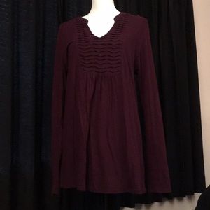 Soft flattering long sleeve maroon top.